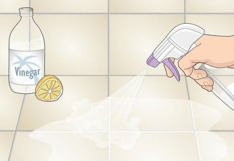 Dùng dấm và nước cốt chanh để tẩy xi măng